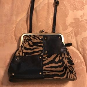 Animal print accent crossbody. 9 X 6. Like new.
